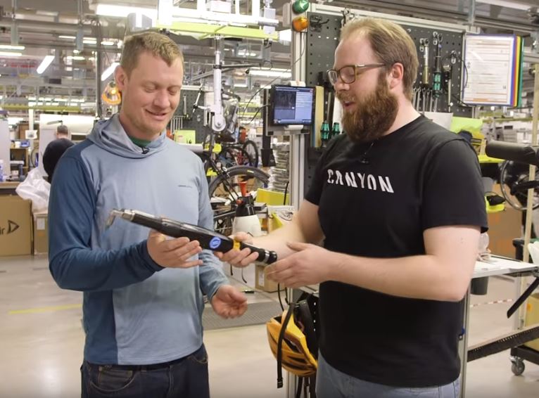 Canyon BikeRadar People Two operators in Canyon manufacture holding STwrench